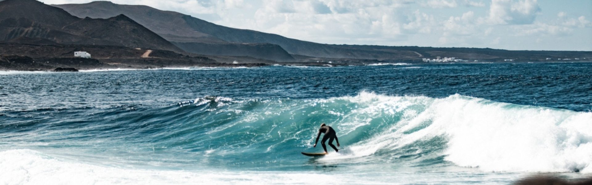 Lanzarote Urlaub, Surfer, Wellen, Atlantik